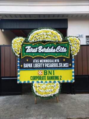 Papan Bunga Duka di Airputih