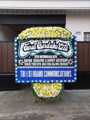 Papan Bunga Duka di Airputih